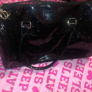 Queen Latifa makeup bag